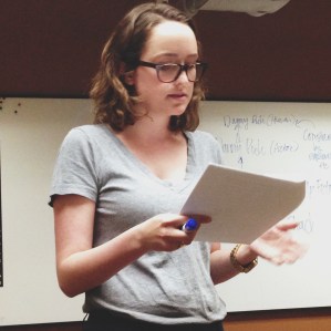 Photo of me getting said presentation, courtesy of my friend Sarah, who is a great source of moral support.
